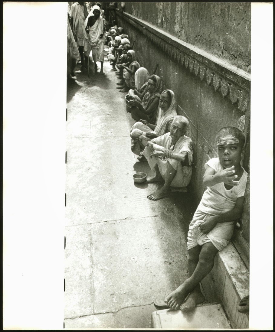 Hindu Widows are waiting in a Lane for Alms.  Probably in Varanasi - c1980's