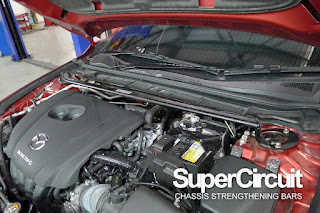 SUPERCIRCUIT Front Strut Bar installed to the Mazda3 BP Liftback