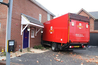 TRUCK RAMMED INTO STORE/HOUSE