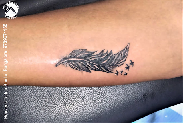 http://heavenstattoobangalore.in/feather-tattoo-at-heavens-tattoo-studio-bangalore/