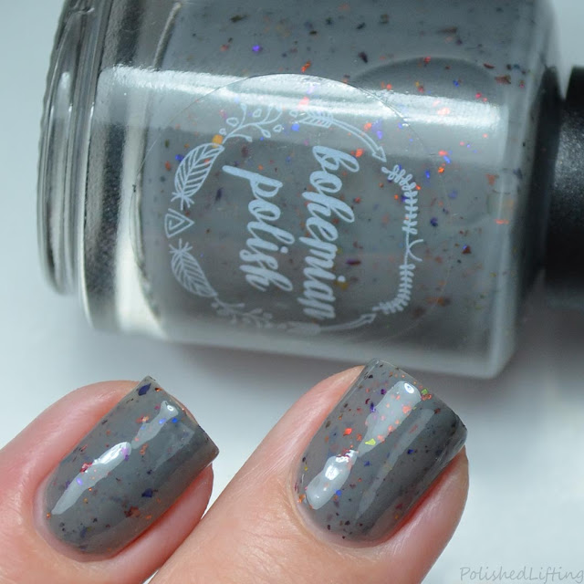 gray nail polish with color shifting flakies