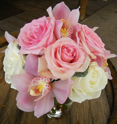 This bridal bouquet consisted of white Cymbidium Orchids pink miniCalla