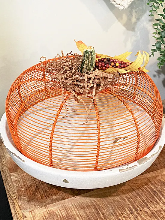 pumpkin basket in a pedestal dish