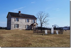 Henry House with Mrs. Henry grave in front of the house