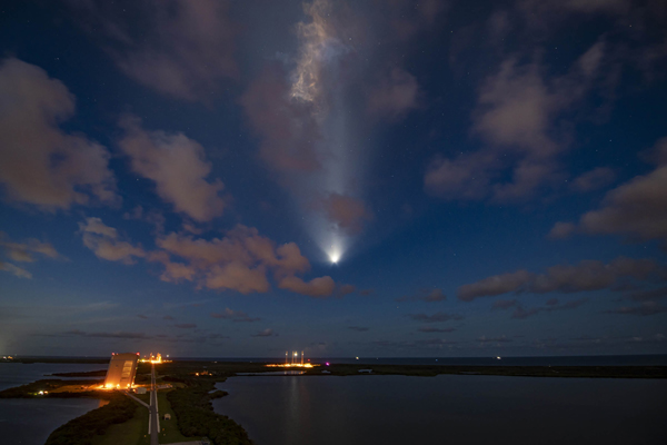 The engine plume from Falcon 9's second stage motor is visible from Cape Canaveral, Florida, a few minutes after launch...on September 15, 2021.