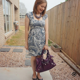 awayfromblue Instagram | spring office outfit paisley print sheath dress purple bag balenciaga work