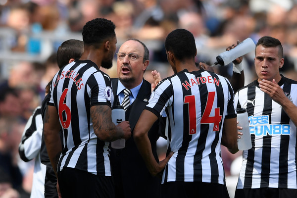 Rafael Benitez, Manager of Newcastle United speaks to Jamaal Lascelles of Newcastle United and Isaac Hayden of Newcastle United during the Premier League match between Newcastle United and Tottenham Hotspur at St. James Park on August 13, 2017 in Newcastle upon Tyne, England. (Aug. 12, 2017 - Source: Stu Forster/Getty Images Europe)