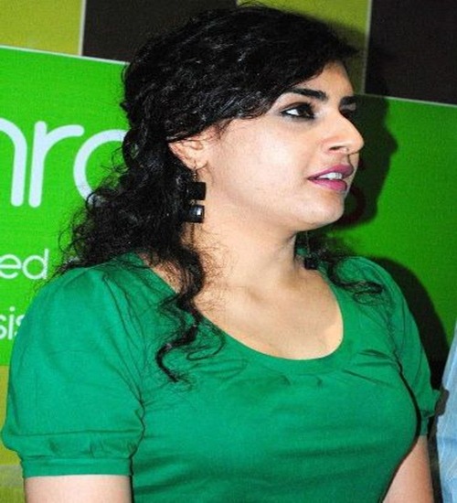 Archana Veda Looking in Green Top