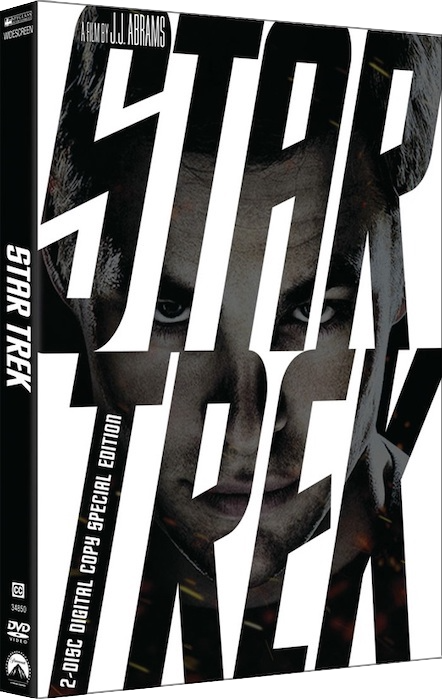 DVD box of 2009 'Star Trek' with the face of Chris Pine as Kirk seen through the letters of the title