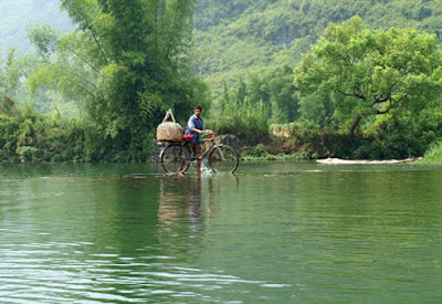 Man crossing yulong river