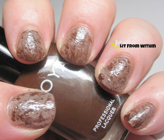 Saran Wrap mani!  I actually did this with a piece of grocery bag and a bit of Zoya Louise