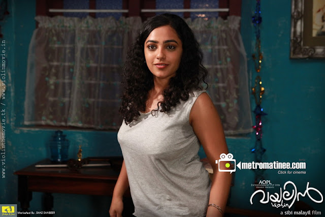 nithya menon hot boob show in malayalam movie violin