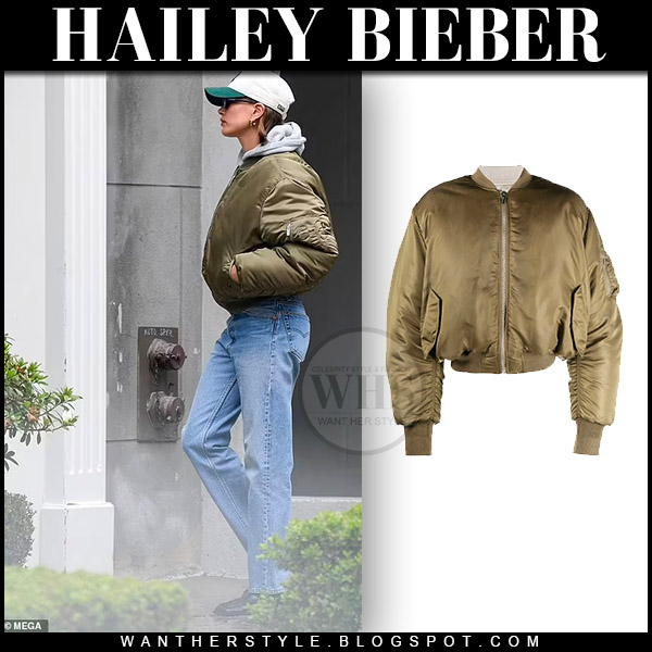 Hailey Bieber in khaki bomber jacket and jeans