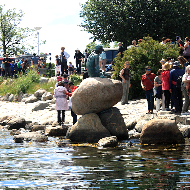 The Little Mermaid draws a crowd in Copenhagen, Denmark