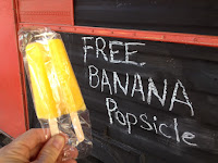 Free Banana Popsicle, courtesy of FryDeez. August temperature over 100 degrees F.
