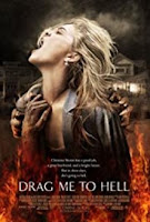 Image of the Drag Me To Hell DVD cover art which shows a blond woman throwing her head back and screaming in anguish with what appears to be a hint of flames flickering up around her