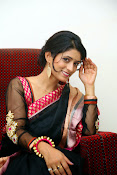 Nidhi Natuiyal Glamorous Photos in Saree-thumbnail-15