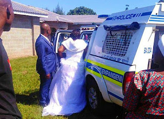 The South African police taking away both the bride and the bridegroom for defying the lockdown orders