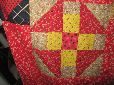 red and chrome yellow antique churndash quilt block