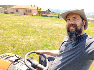 Happily on the mower again