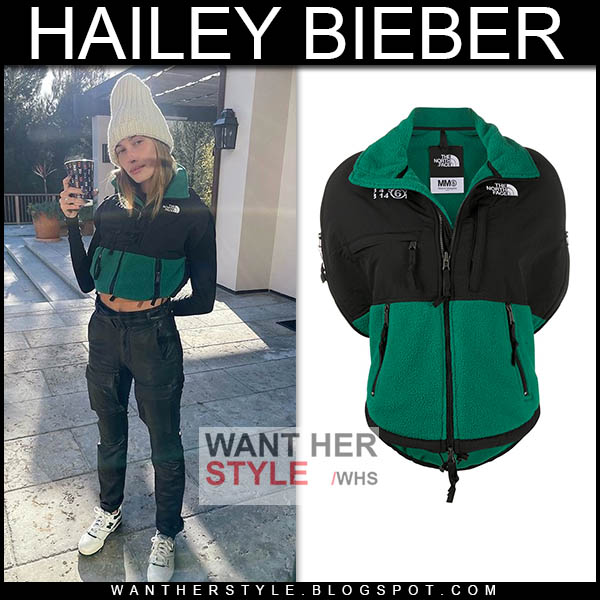 Hailey Bieber in green fleece jacket and black pants
