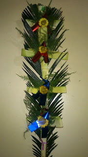 catholic cross in davao city,cross, palm leaves