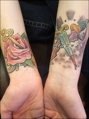 Rose with key and dagger wrist tattoos
