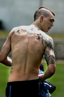 agger with full design tattoo in arm
