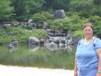 The water falls in this gorgeous Japanese gardens was built from green serpentine rock and coy fish swam in the waters.... very serene and lovely