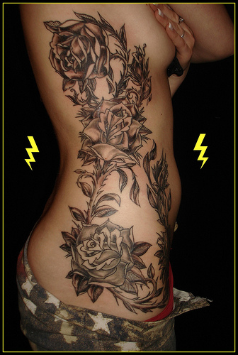 tattoo on side of stomach. Side Body Black Flower Tattoos