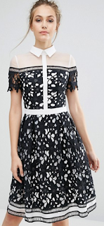 http://www.asos.com/chi-chi-london/chi-chi-london-premium-lace-panelled-dress-with-contrast-collar/prd/7293609?iid=7293609&clr=Blackwhite&SearchQuery=&cid=12970&pgesize=36&pge=1&totalstyles=638&gridsize=3&gridrow=5&gridcolumn=1