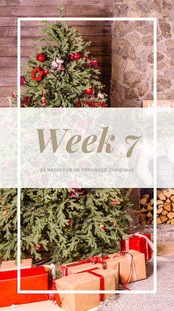 Graphic showing a Christmas tree, presents and edge of a fire place with week 7 across the image