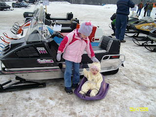 Tristyn x26amp; Maddy at a vintage snowmobile show. That's Tony's 1973 Arctic Cat Panther. Tris with her brand new helmet