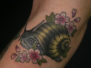 Snail tattoo image gallery