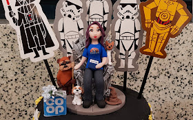 Cake topper with laura star wars and coop designs