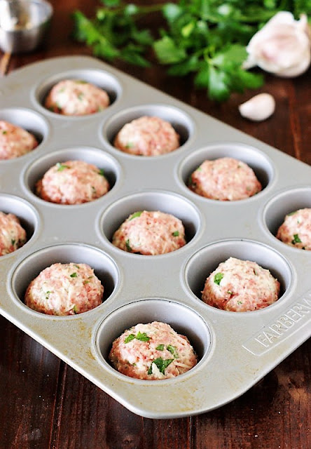 Unbaked Meatballs in Muffin Pan Image
