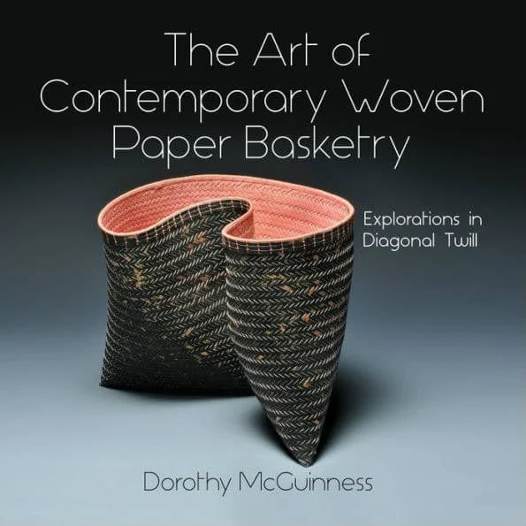 woven paper basket on book cover