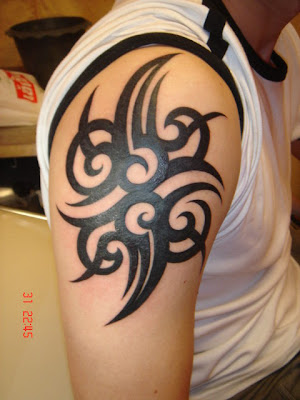 This one a perfect symmetrical tribal tattoo The tattoo looks like it is