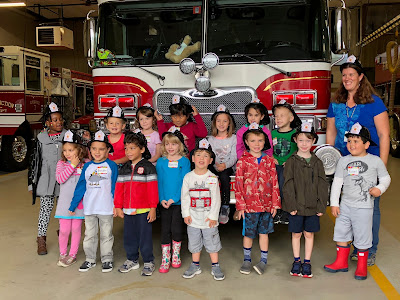 class picture at the fire station