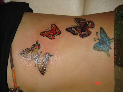 butterflies tattoos. Colorful Butterflies Tattoo at