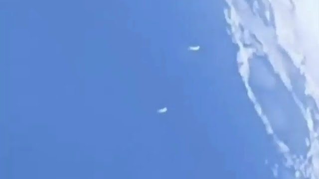 3 UFOs flying over the Moon in spectacular UFO video.