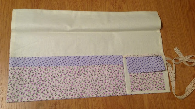 finished crochet hook roll with top turned back showing fold