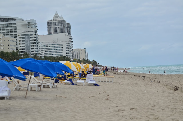 Sunbathers and families gather on Miami's South Beach.