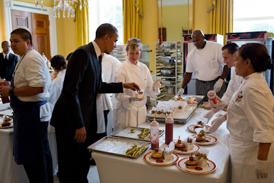 President Obama samples a baked zucchini fry in the Old Family Dining Room after the Kids’ State Dinner Aug. 20, 2012. (Official White House Photo by Pete Souza)