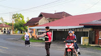 Pagi yang Tertib, Jalan yang Aman: Polsek Tanjung Mutiara Hadirkan Senyuman di Setiap Persimpangan"