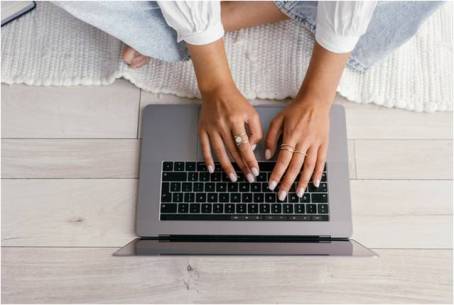 a woman using a laptop for work