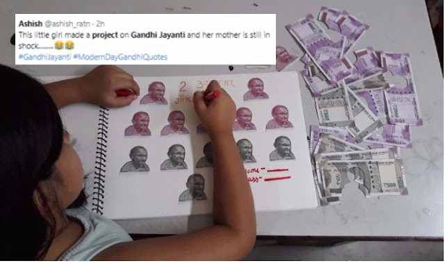 Picture of Girl Completing Gandhi Jayanti Project by Cutting Rs 500 & Rs 2000 Currency Notes