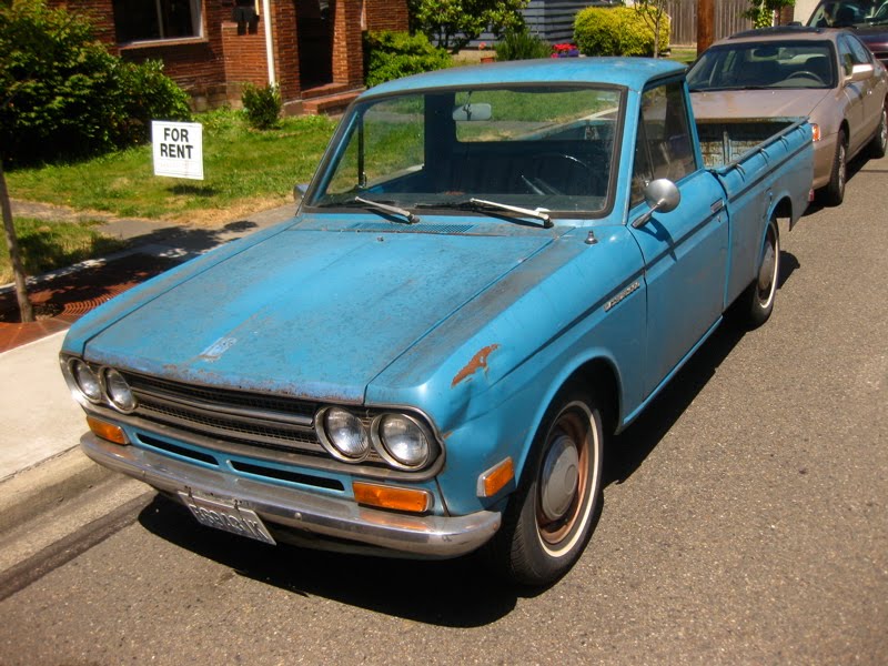 Little Blue Pickup 2 1969 Datsun 1600 Pickup right across the street