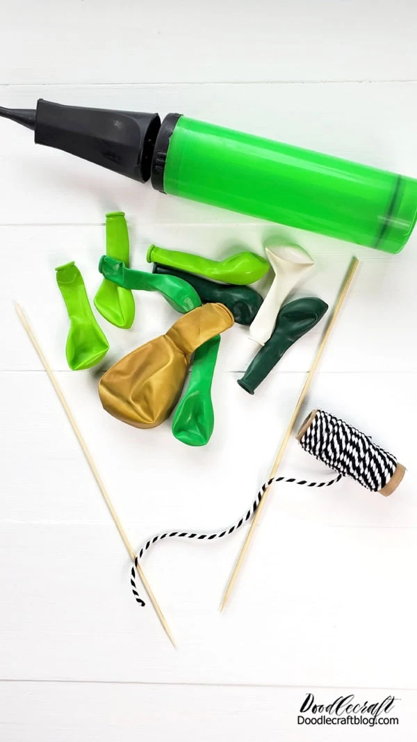 Supplies Needed for Balloon Garland Cake Topper:  Balloon Hand Pump Balloons (about 5-10) Bakers Twine Wooden Skewers