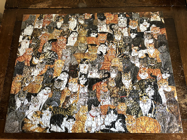 A puzzle of the painting, “Double Cat Spread,” 1988, by Ditz.